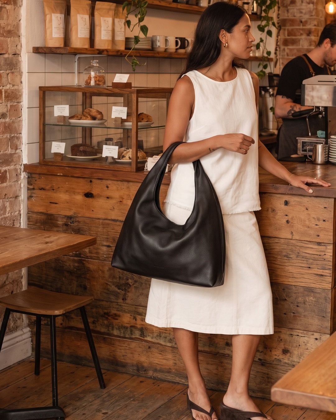 Elodie Shoulder Bag in black, detail of hardware and strap