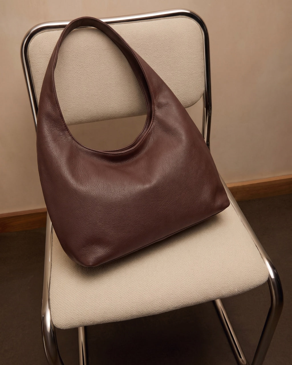 Elodie Shoulder Bag in brown, detail of hardware and strap