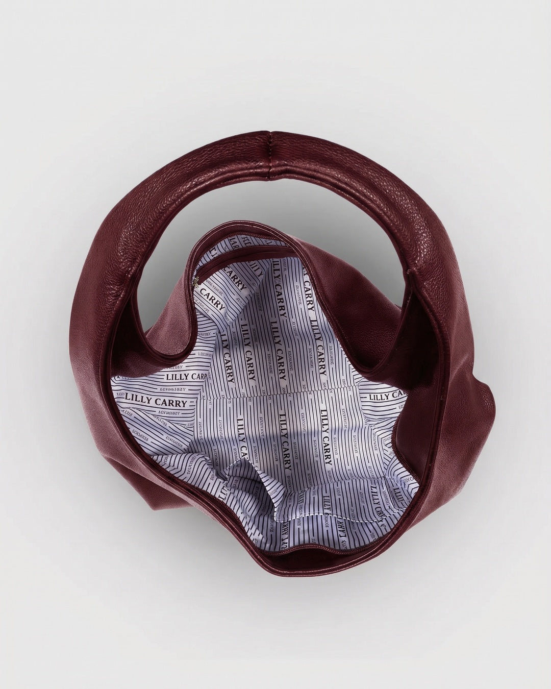 Burgundy Elodie Shoulder Bag styled as an everyday crossbody bag